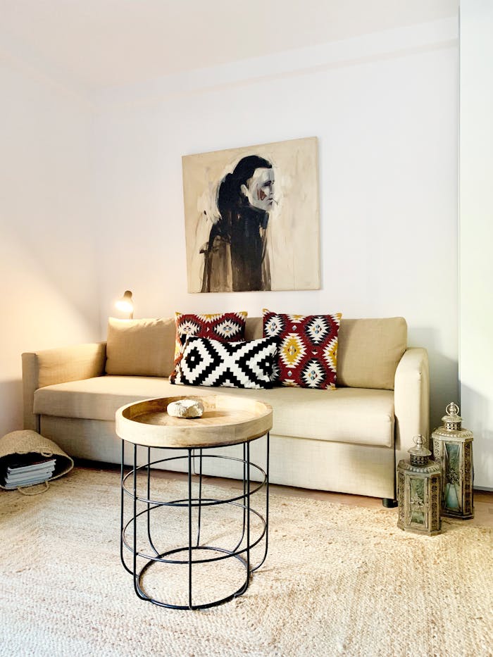 Comfortable contemporary living room with abstract art and cozy furnishings, perfect for interior design inspiration.